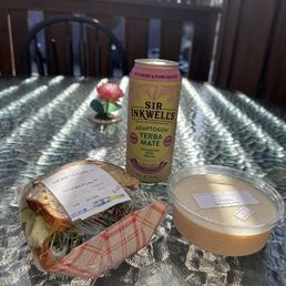 Gluten free veggie sandwhich, cold drink, and house made tapioca pudding! Eating in the little seating area they have Gluten free veggie sandwhich, cold drink, and house made tapioca pudding! Eating in the little seating area they have