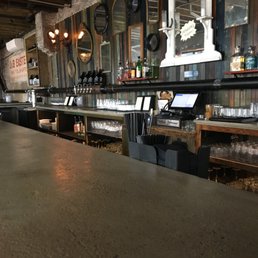 Cool vintage pieces behind the bar and reclaimed wood look.  Ambiance was nice here.