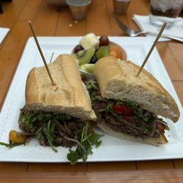 Roasted Lamb Sandwich with a side of fruit