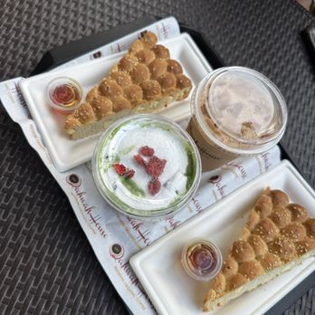Qahwah House - Strawberry Matcha, Iced Adeni Chai, Khaliat Alnahl - Coffee & Tea Near Me - Charlotte, North Carolina Qahwah House - Strawberry Matcha, Iced Adeni Chai, Khaliat Alnahl - Coffee & Tea Near Me - Charlotte, North Carolina