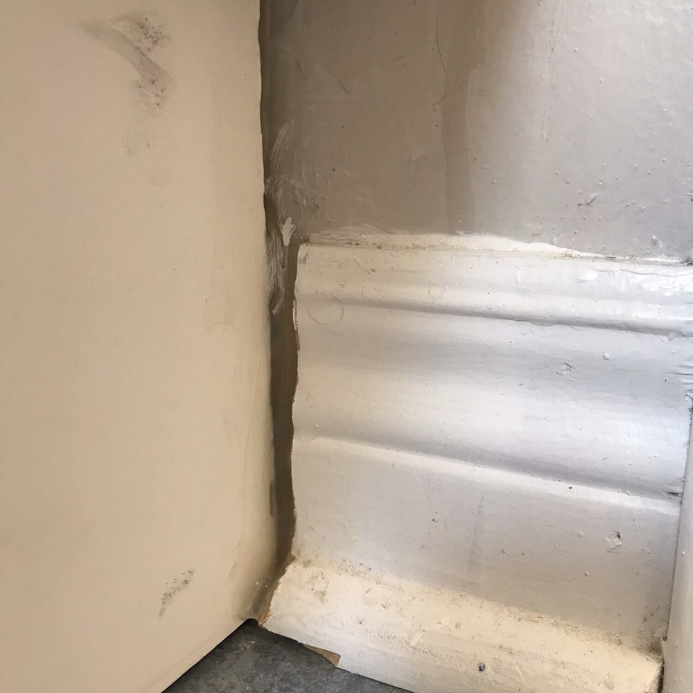 Fixit4You - More caulking between the toe kick j see the vanity and the wall/trim.  Really?? - Handyman Near Me - Oshawa, Ontario