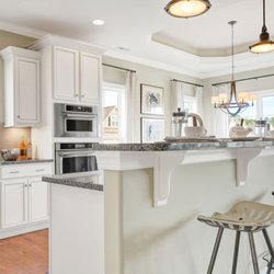 Pine Forest Of Oak Island - Luxury kitchen and homes by Trusst Builder Group at Pine Forest.