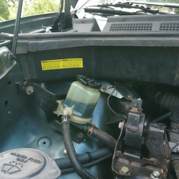 Bailey's Auto Service - Incorrect installation of reservoir tank.  Example of poor quality work. - Auto Repair Near Me - Mishawaka, Indiana