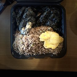 Tap Tap Restaurant  - Diri djondjon (Black mushroom rice)  Lalo (Jute Leaves, Beef, Spinach and Blue Crab Stew)