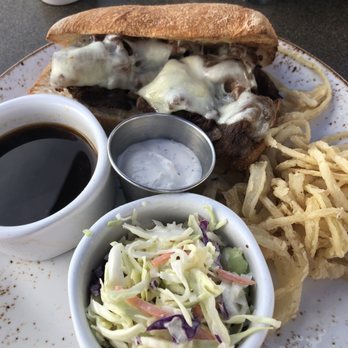 Parkers' Lighthouse - French dip with melted cheese, au juice, horseradish, fried onions and coleslaw. - Seafood Near Me - Long Beach, California Parkers' Lighthouse - French dip with melted cheese, au juice, horseradish, fried onions and coleslaw. - Seafood Near Me - Long Beach, California
