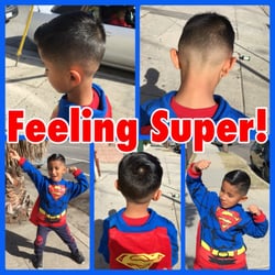 Jake's Barber Shop - 11/28/2015 Well-blended, tight, low fade; trimmed comb over.