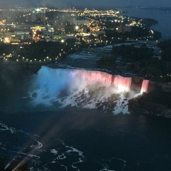 Skylon Tower - Falls lit up around 9 pm. - Canadian (New) Near Me - Niagara Falls, Ontario Skylon Tower - Falls lit up around 9 pm. - Canadian (New) Near Me - Niagara Falls, Ontario