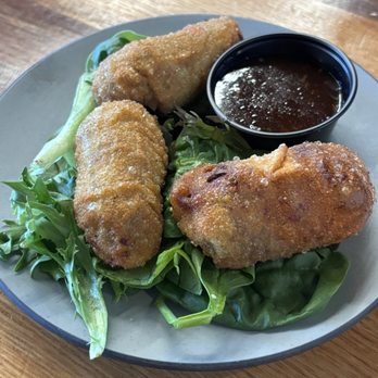 Pinhouse Social - Shredded pork egg roll. Seasoned, and cook to crisp perfection! - Sports Bars Near Me - Fort Wayne, Indiana Pinhouse Social - Shredded pork egg roll. Seasoned, and cook to crisp perfection! - Sports Bars Near Me - Fort Wayne, Indiana