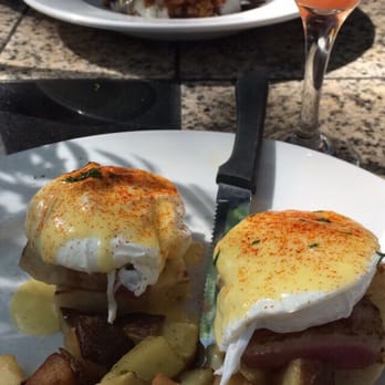 Three's Bar & Grill - Pineapple-guava mimosa and eggs Benedict. - Asian Fusion Near Me - Kihei, Hawaii
