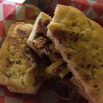 Chop Shop - Sausage wallet. Chunks of sausage, cheese, onions on a soft focaccia bun. Outrageous!! - American Near Me - Butler, Pennsylvania Chop Shop - Sausage wallet. Chunks of sausage, cheese, onions on a soft focaccia bun. Outrageous!! - American Near Me - Butler, Pennsylvania