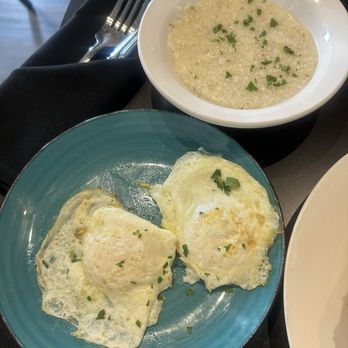 Blake’s Place - Grits with over easy eggs. - Italian Near Me - New Orleans, Louisiana Blake’s Place - Grits with over easy eggs. - Italian Near Me - New Orleans, Louisiana