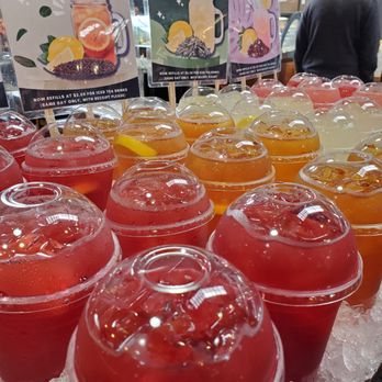 Granville Island - Cups of juice ready to go, have your pick - Shopping Centers Near Me - Vancouver, British Columbia
