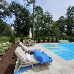 D&G Landscaping & Design - 6 months after planting and retaining wall