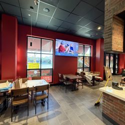Low Volt Experts - 85inch TV in the dining area at Slice House