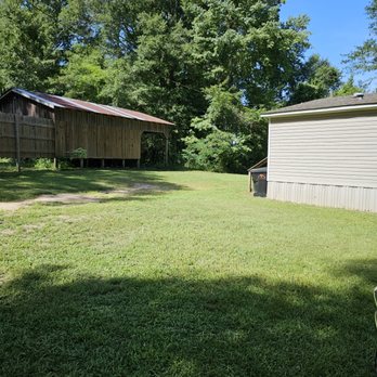Cornett's Lawncare - the back yard of a home - Lawn Services Near Me - West Monroe, Louisiana
