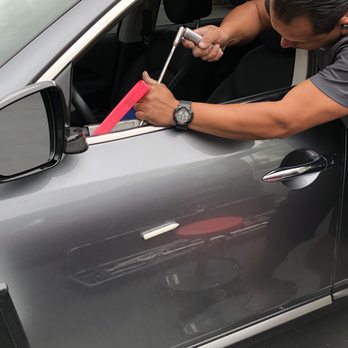 Magic Dent Removal - Senor Manuel pulling dent out. No more. Or at least not so noticeable. - Mobile Dent Repair Near Me Magic Dent Removal - Senor Manuel pulling dent out. No more. Or at least not so noticeable. - Mobile Dent Repair Near Me