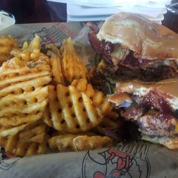Muddy Cow - Rodeo Cow burger and waffle fries. - Sports Bars Near Me - Cottage Grove, Minnesota