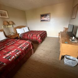 The Rim Rock Inn - Regular room no extra sq feet. No micro wave or mini fridge. Just a regular room with comfy bed and blankets
