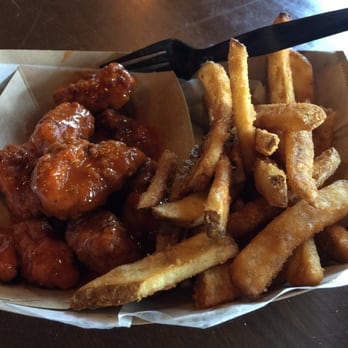 The Sett - Boneless wings with buffalo sauce and side of fries. ~$9 - New American Near Me - Madison, Wisconsin