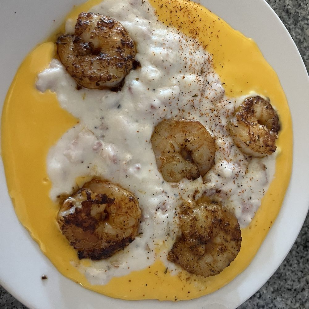 Center Street Nook - Shrimp & Grits. Lots of bacon, Old Bay and cheese. Shared plate but so yummy!! - Breakfast & Brunch Near Me - Jupiter, Florida Center Street Nook - Shrimp & Grits. Lots of bacon, Old Bay and cheese. Shared plate but so yummy!! - Breakfast & Brunch Near Me - Jupiter, Florida