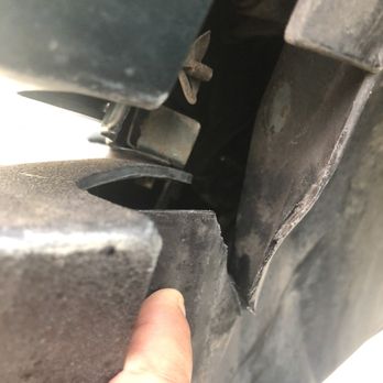 Cadillac Express Car Wash - Rubber was sliced by car wash underneath front bumper - Car Wash Near Me - Tomball, Texas