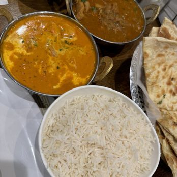 Daawath Indian Cuisine - Top/Right: Chicken Vindaloo Bottom/Left: Butter Chicken(BC) - Indian Near Me - Novi, Michigan