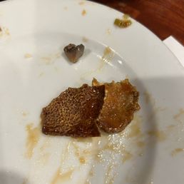 a half eaten piece of food on a plate