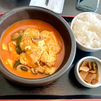 Mura Asian Eatery - Spicy Soft Tofu Stew with mushroom comes with rice & pickles . More soup than stew. Mild but tasty. $12 4* - Japanese Near Me - Seattle, Washington Mura Asian Eatery - Spicy Soft Tofu Stew with mushroom comes with rice & pickles . More soup than stew. Mild but tasty. $12 4* - Japanese Near Me - Seattle, Washington