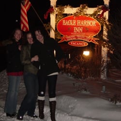 Eagle Harbor Inn - The girls with the Eagle Harbor Inn sign