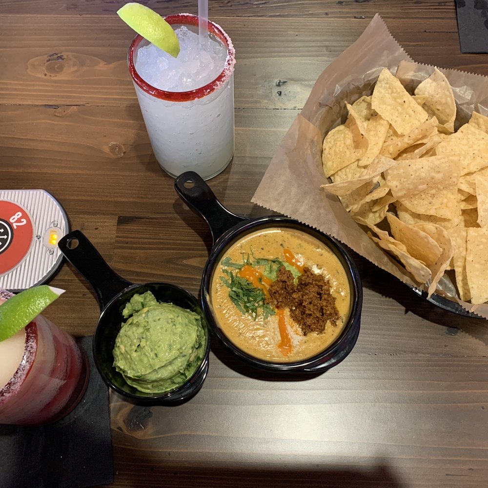 Torchy's Tacos - Half order of guacamole and hillbilly queso - Tex-Mex Near Me - Fishers, Indiana Torchy's Tacos - Half order of guacamole and hillbilly queso - Tex-Mex Near Me - Fishers, Indiana