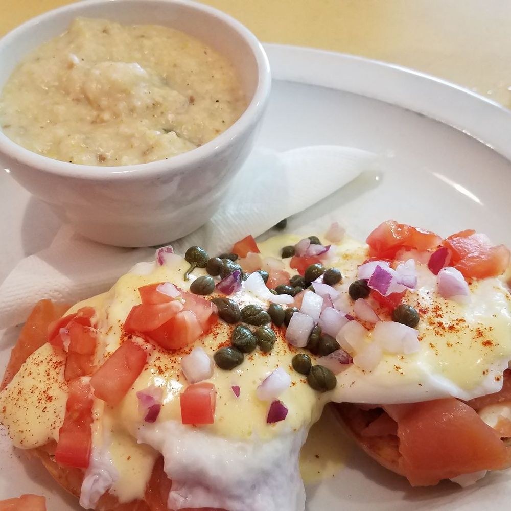 Wild Eggs - Lox and a poached egg on a small bagel benedict. Grits changes daily. The one in the picture has chorizo, and green chilli. Very good. - Breakfast & Brunch Near Me - Carmel, Indiana Wild Eggs - Lox and a poached egg on a small bagel benedict. Grits changes daily. The one in the picture has chorizo, and green chilli. Very good. - Breakfast & Brunch Near Me - Carmel, Indiana