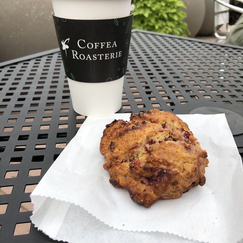 Coffea - a muffin and a cup of coffee on a table - Coffee & Tea Near Me - Sioux Falls, South Dakota