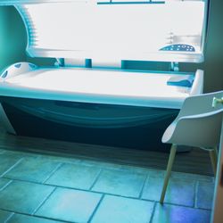 Four Seasons Tanning - Medium pressure tanning bed-Our roomy and comfortable tanning superstar! Featuring a cooled body fan and quartz facial lamps. 12 minute max