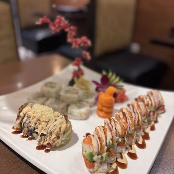 May Island Restaurant - Godzilla Roll (6 Pieces) on the left, the May Island Hako Sushi on the right - Japanese Near Me - Alexandria, Virginia May Island Restaurant - Godzilla Roll (6 Pieces) on the left, the May Island Hako Sushi on the right - Japanese Near Me - Alexandria, Virginia