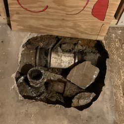 Gold Key Home Inspections - Hole in the floor covered by a board.