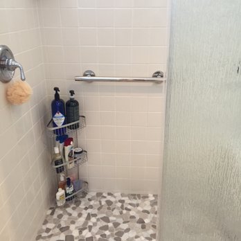 SD Remodeling Pro - Our older shower  - freshened with pebble stone floors and grab bar! - General Contractors Near Me - Vista, California