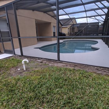 One America Rehab Solution - a pool in a backyard - General Contractors Near Me - Davenport, Florida One America Rehab Solution - a pool in a backyard - General Contractors Near Me - Davenport, Florida