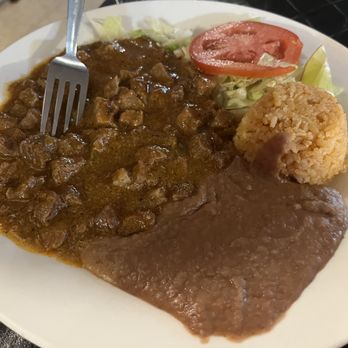 Mi Jacalito Mexican Restaurant - Carne guisado with rice, refried beans and a side salad - Mexican Near Me - Escobares, Texas Mi Jacalito Mexican Restaurant - Carne guisado with rice, refried beans and a side salad - Mexican Near Me - Escobares, Texas