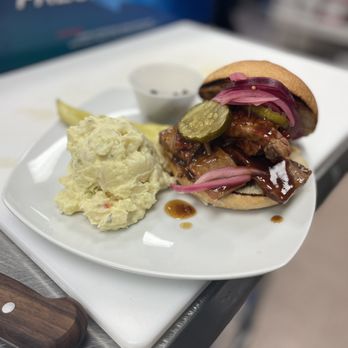 Little Maria's Cafe - Brisket sandwich, with potato salad and pickled red onion with pickles. - Salad Near Me - Houston, Texas Little Maria's Cafe - Brisket sandwich, with potato salad and pickled red onion with pickles. - Salad Near Me - Houston, Texas