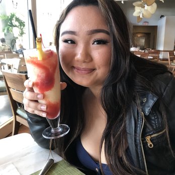 Mariposa - 21 and got her a strawberry daiquiri - New American Near Me - Honolulu, Hawaii