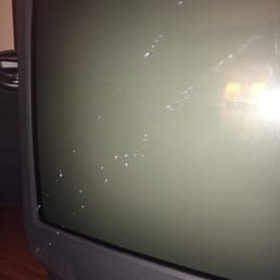 Semen or god know what was splashed all over the TV and the dresser. A sticker on the corner. Semen or god know what was splashed all over the TV and the dresser. A sticker on the corner.