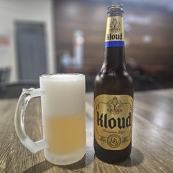 92 Chicken - Kloud Beer served with frosted glass