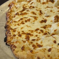 Fratelli's Wood-Fired Pizzeria - Cheesy garlic bread
