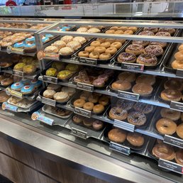 a variety of donuts on display a variety of donuts on display
