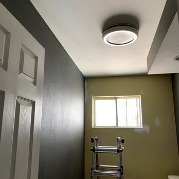 Cali Interior Builders - Restroom with new drywall, texture and paint. - General Contractors Near Me
