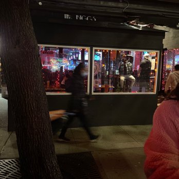 Mr Biggs Bar & Grill - a woman walking by - American Near Me - New York, New York Mr Biggs Bar & Grill - a woman walking by - American Near Me - New York, New York
