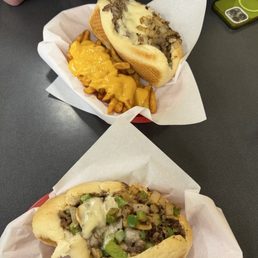 Onions cheese steak belly buster plus cheese fries combo and the pepper onion mushroom Onions cheese steak belly buster plus cheese fries combo and the pepper onion mushroom