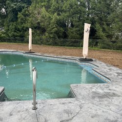 Juliano's Pools LLC - A BioGuard Platinum Dealer - Dirt going into the pool. But it's graded correctly.
