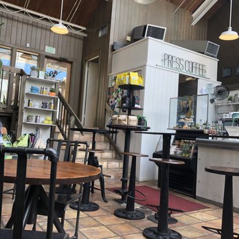 PRESS Coffee - Small seating in front of bar - Coffee & Tea Near Me - San Antonio, Texas PRESS Coffee - Small seating in front of bar - Coffee & Tea Near Me - San Antonio, Texas