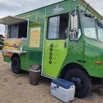 Shuck Shack - a green food truck parked on the side of the road - Food Stands Near Me - Arlington, Virginia Shuck Shack - a green food truck parked on the side of the road - Food Stands Near Me - Arlington, Virginia